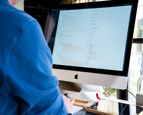 PC and display technology setup with bright screens